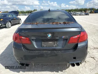 2014 BMW M5 with VIN WBSFV9C54ED097865, listed as a Copart auction lot 79897384 with 0 mi miles and Salvage Title. Bid and sale history available at carsss.com. Image 6.