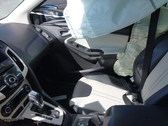 2012 Ford Focus SEL with VIN 1FAHP3M22CL378874, listed as a IAAI auction lot 41786414 with 190,504 mi miles. Bid and sale history available at carsss.com. Image 5.