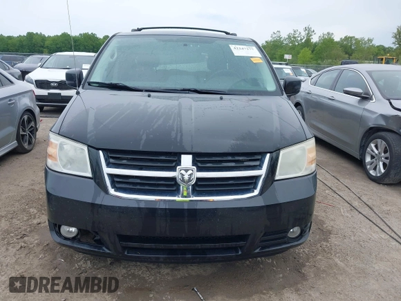 2010 Dodge Grand Caravan SXT z VIN 2D4RN5D12AR444953, wystawiony jako IAAI lot #42247277 z przebiegiem 214 387 mil mil oraz . Historia ofert i sprzedaży dostępna na DreamBid. Obrazek 12.