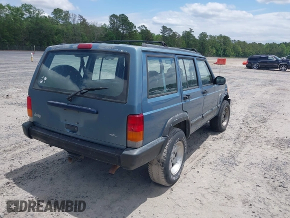 1998 Jeep Cherokee Sport with VIN 1J4FT68S6WL272337, listed as a IAAI auction lot 42147195 with 302,764 mi miles. Bid and sale history available at carsss.com. Image 4.