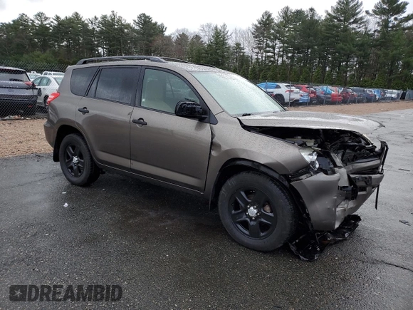 2011 Toyota RAV4 with VIN JTMBF4DVXBD042935, listed as a Copart auction lot 52228705 with 94,849 mi miles and Salvage Title. Bid and sale history available at carsss.com. Image 4.