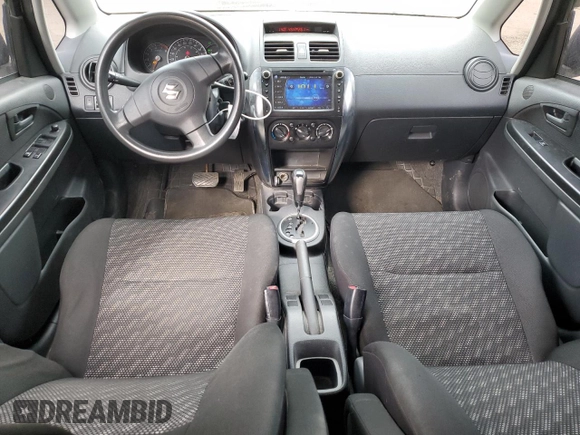 2009 Suzuki SX4 with VIN JS2YA411895100156, listed as a Copart auction lot 77779704 with 235,846 mi miles and Salvage Title. Bid and sale history available at carsss.com. Image 7.