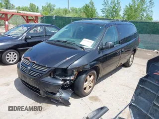 2005 Dodge Caravan SXT z VIN 2D4GP44L35R498670, wystawiony jako IAAI lot #42278939 z przebiegiem Nie podano mil oraz . Historia ofert i sprzedaży dostępna na DreamBid. Obrazek 2.