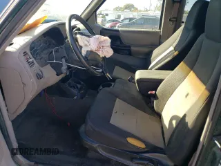 1999 Ford Ranger XLT with VIN 1FTYR14X1XPA61459, listed as a Copart auction lot 76380064 with 292,940 mi miles and Salvage Title. Bid and sale history available at DreamBid. Image 7.