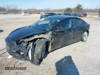 2022 Tesla Model 3 with VIN 5YJ3E1EA1NF304811, listed as a IAAI auction lot 41559342 with 29,597 mi miles and . Bid and sale history available at DreamBid. Image 2.
