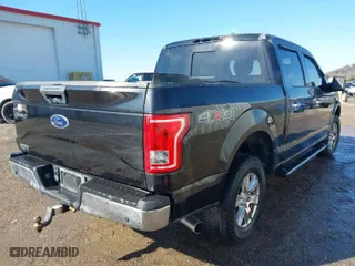 2015 Ford F-150 XLT with VIN 1FTEW1EG6FKE03526, listed as a IAAI auction lot 41543389 with 113,022 mi miles. Bid and sale history available at carsss.com. Image 4.
