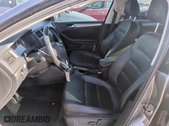 2013 Volkswagen Jetta TDI w/Premium с VIN 3VWLL7AJ5DM256459, выставлен на аукционе Copart как лот 59716405 с пробегом 162 464 миль миль и Списание • Salvage title. История ставок и продаж доступна на DreamBid. Изображение 7.