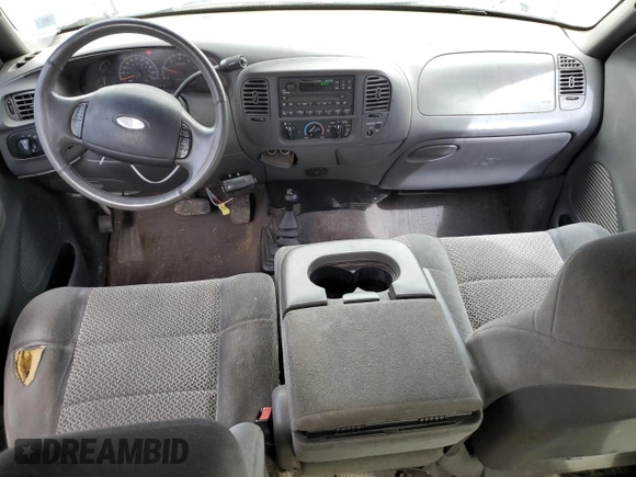 2001 Ford F-150 XL z VIN 1FTRX18L41NB56019, wystawiony jako Copart lot #62537655 z przebiegiem Nie podano mil oraz Szkoda całkowita • Salvage title. Historia ofert i sprzedaży dostępna na DreamBid. Obrazek 8.