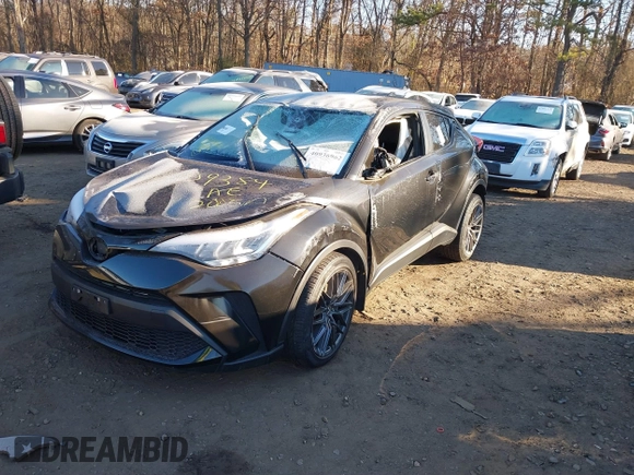 2021 Toyota C-HR LE with VIN JTNKHMBX1M1118203, listed as a IAAI auction lot 40936962 with 18,424 mi miles. Bid and sale history available at carsss.com. Image 2.