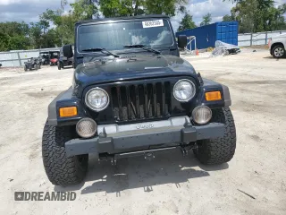 2006 Jeep Wrangler Sport with VIN 1J4FA49S36P704481, listed as a Copart auction lot 48362505 with 122,600 mi miles and Salvage Title. Bid and sale history available at carsss.com. Image 5.