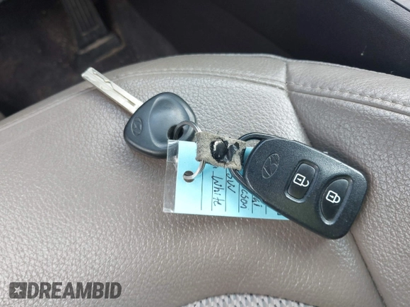 2015 Hyundai Tucson GLS with VIN KM8JT3AF6FU982128, listed as a IAAI auction lot 42227235 with 141,612 mi miles and . Bid and sale history available at DreamBid. Image 11.