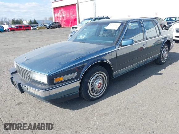 1986 Cadillac Seville z VIN 1G6KS6989GU813079, wystawiony jako IAAI lot #41732353 z przebiegiem Nie podano mil oraz . Historia ofert i sprzedaży dostępna na DreamBid. Obrazek 17.