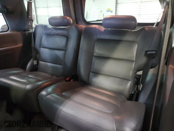 2002 Ford Explorer Sport XLS z VIN 1FMZU70E42UC30826, wystawiony jako Copart lot #42163415 z przebiegiem 148 764 mil mil oraz Szkoda całkowita • Salvage title. Historia ofert i sprzedaży dostępna na DreamBid. Obrazek 11.