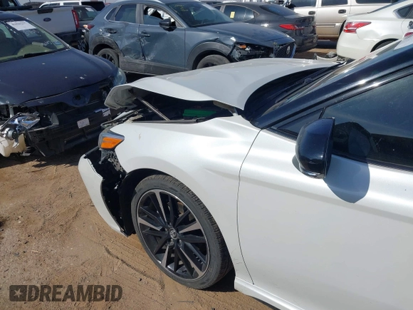 2020 Toyota Camry XSE with VIN 4T1K61AK8LU315568, listed as a IAAI auction lot 41887694 with 157,363 mi miles and . Bid and sale history available at DreamBid. Image 6.