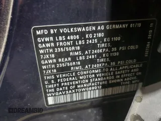 2013 Volkswagen Tiguan S with VIN WVGAV3AX7DW069012, listed as a Copart auction lot 55720975 with 133,381 mi miles and Salvage title. Bid and sale history available at DreamBid. Image 14.