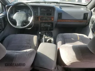 1998 Jeep Grand Cherokee Laredo with VIN 1J4GZ58S6WC319444, listed as a Copart auction lot 53147665 with 217,068 mi miles and Salvage Title. Bid and sale history available at carsss.com. Image 8.