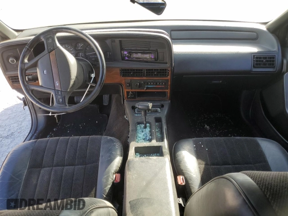 1991 Mercury Cougar z VIN 1MEPM60T2MH600363, wystawiony jako Copart lot #76543714 z przebiegiem 169 767 mil mil oraz Szkoda całkowita • Salvage title. Historia ofert i sprzedaży dostępna na DreamBid. Obrazek 8.