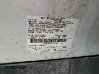 2017 Ford Taurus SEL z VIN 1FAHP2E87HG120587, wystawiony jako Copart lot #52598435 z przebiegiem 88 270 mil mil oraz Szkoda całkowita • Salvage title. Historia ofert i sprzedaży dostępna na DreamBid. Obrazek 12.