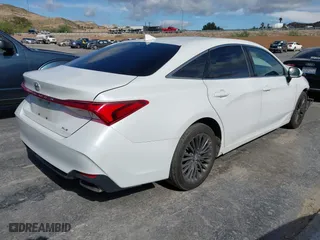 2019 Toyota Avalon XLE with VIN 4T1BZ1FB2KU014289, listed as a IAAI auction lot 41905789 with 121,906 mi miles. Bid and sale history available at carsss.com. Image 4.