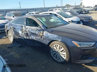 2019 Audi A7 z VIN WAUP2AF23KN033262, wystawiony jako IAAI lot #40678864 z przebiegiem 97 925 mil mil oraz . Historia ofert i sprzedaży dostępna na DreamBid. Obrazek 13.