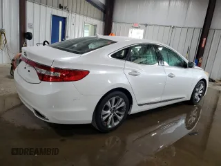 2013 Hyundai Azera z VIN KMHFG4JG7DA229084, wystawiony jako Copart lot #62580265 z przebiegiem 114 505 mil mil oraz Szkoda całkowita • Salvage title. Historia ofert i sprzedaży dostępna na DreamBid. Obrazek 3.