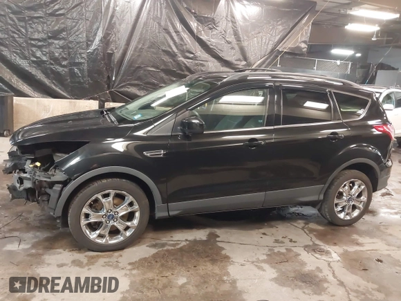2014 Ford Escape SE with VIN 1FMCU9GX7EUA80983, listed as a IAAI auction lot 41504942 with 133,952 mi miles. Bid and sale history available at carsss.com. Image 15.