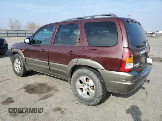 2002 Mazda Tribute LX with VIN 4F2CU08172KM34759, listed as a Copart auction lot 81631974 with 254,286 mi miles and Salvage Title. Bid and sale history available at carsss.com. Image 2.