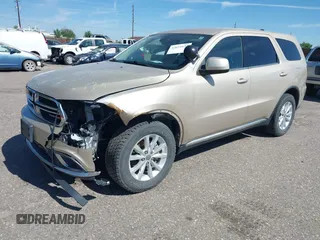 2014 Dodge Durango SXT with VIN 1C4RDJAG0EC455787, listed as a IAAI auction lot 42651627 with 103,218 mi miles and . Bid and sale history available at DreamBid. Image 2.