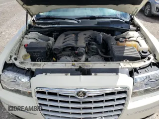 2010 Chrysler 300 Touring z VIN 2C3CA5CV1AH241629, wystawiony jako Copart lot #54841465 z przebiegiem 57 238 mil mil oraz Szkoda całkowita • Salvage title. Historia ofert i sprzedaży dostępna na DreamBid. Obrazek 11.