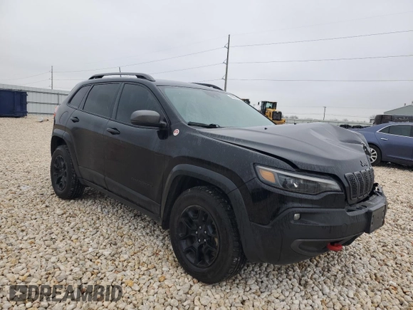2021 Jeep Cherokee Trailhawk with VIN 1C4PJMBX5MD123854, listed as a Copart auction lot 45891165 with 98,964 mi miles and Salvage title. Bid and sale history available at DreamBid. Image 4.