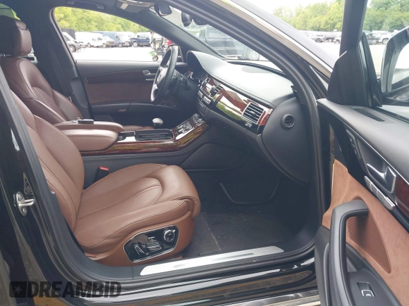 2013 Audi A8 3.0L с VIN WAURGAFD8DN012938, выставлен на аукционе IAAI как лот 42334901 с пробегом 64 235 миль миль и . История ставок и продаж доступна на DreamBid. Изображение 5.