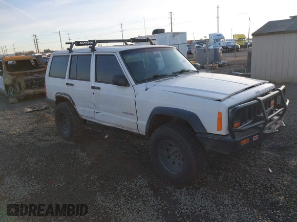 2000 Jeep Cherokee z VIN 1J4FF28P6YL132738, wystawiony jako IAAI lot #41382855 z przebiegiem 196 213 mil mil oraz . Historia ofert i sprzedaży dostępna na DreamBid. Obrazek 1.