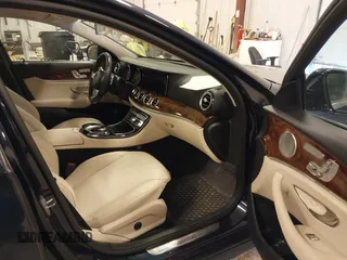2018 Mercedes-Benz E with VIN WDDZF4KB7JA382850, listed as a IAAI auction lot 41991305 with 56,187 mi miles. Bid and sale history available at carsss.com. Image 5.