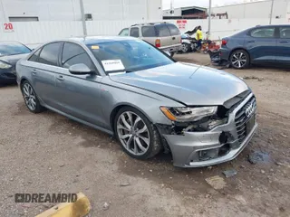 2013 Audi A6 3.0T Prestige with VIN WAUHGAFC3DN131239, listed as a IAAI auction lot 41168869 with 134,628 mi miles. Bid and sale history available at carsss.com. Image 1.