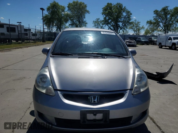 2008 Honda Fit z VIN JHMGD38498S053208, wystawiony jako Copart lot #51540825 z przebiegiem 174 509 mil mil oraz Szkoda całkowita • Salvage title. Historia ofert i sprzedaży dostępna na DreamBid. Obrazek 5.