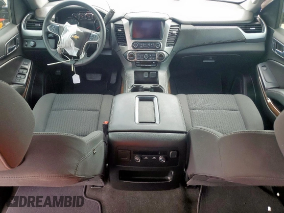 2018 Chevrolet Tahoe LS with VIN 1GNSCAKC5JR374315, listed as a Copart auction lot 54760295 with 50,580 mi miles and Salvage title. Bid and sale history available at DreamBid. Image 8.