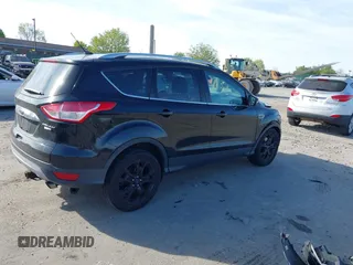 2016 Ford Escape Titanium with VIN 1FMCU9J94GUA06028, listed as a IAAI auction lot 42102769 with 88,278 mi miles. Bid and sale history available at carsss.com. Image 4.