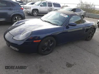 2000 Porsche Boxster z VIN WP0CA2981YU626756, wystawiony jako Copart lot #51706035 z przebiegiem 117 369 mil mil oraz Tytuł czysty. Historia ofert i sprzedaży dostępna na DreamBid. Obrazek 1.
