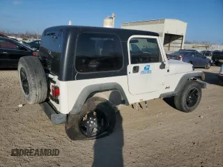 2004 Jeep Wrangler Sport Right Hand Drive with VIN 1J4F449S54P775671, listed as a Copart auction lot 85610114 with 199,074 mi miles and Salvage Title. Bid and sale history available at carsss.com. Image 3.