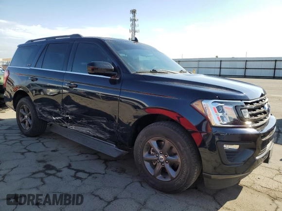 2021 Ford Expedition XL with VIN 1FMJU1FT2MEA54369, listed as a Copart auction lot 71994894 with 35,094 mi miles and Salvage Title. Bid and sale history available at carsss.com. Image 4.