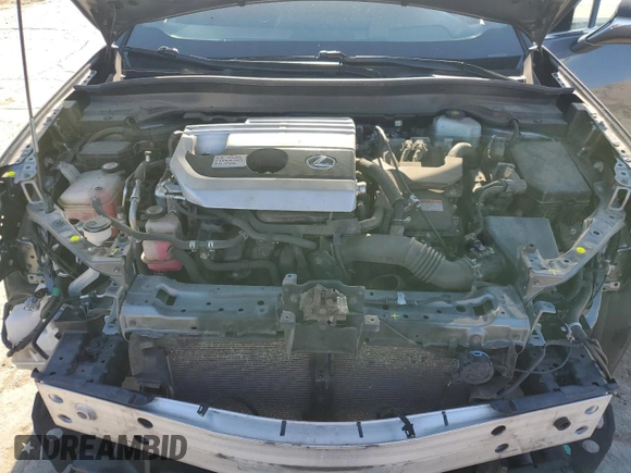 2019 Lexus UX 250h with VIN JTHU9JBH1K2004628, listed as a Copart auction lot 56522165 with 103,168 mi miles and Salvage title. Bid and sale history available at DreamBid. Image 11.