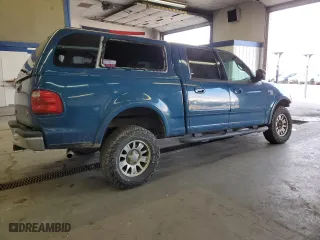 2001 Ford F-150 SuperCrew XLT with VIN 1FTRW08LX1KE90912, listed as a Copart auction lot 48596235 with 282,953 mi miles and Salvage Title. Bid and sale history available at carsss.com. Image 3.