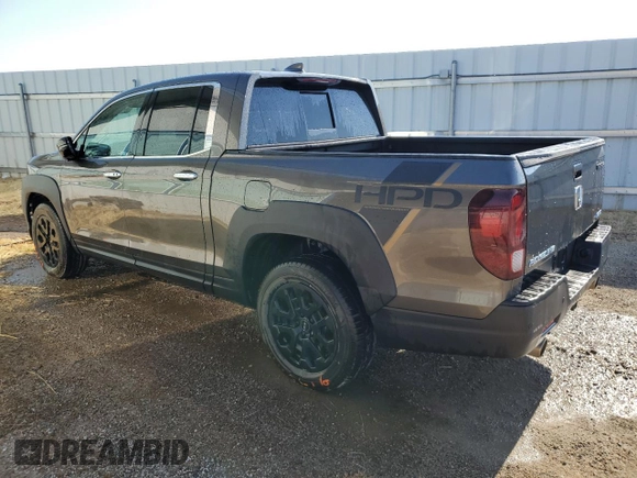 2022 Honda Ridgeline RTL-E with VIN 5FPYK3F79NB037874, listed as a Copart auction lot 65616285 with 39,856 mi miles and Clean title. Bid and sale history available at DreamBid. Image 2.