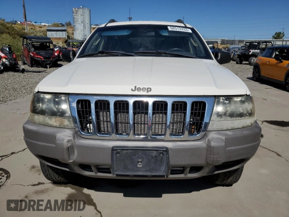2003 Jeep Grand Cherokee Laredo with VIN 1J4GW48S83C517330, listed as a Copart auction lot 52765415 with 108,920 mi miles and Salvage title. Bid and sale history available at DreamBid. Image 5.