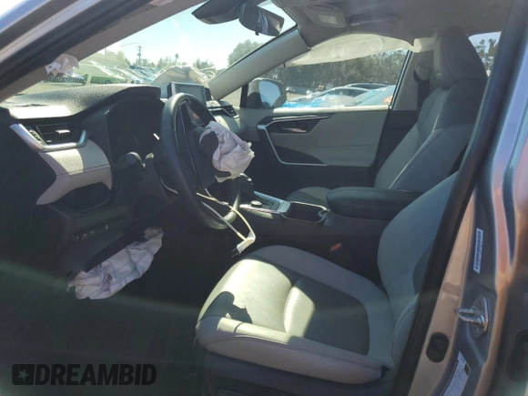 2023 Toyota RAV4 Hybrid XLE Premium z VIN JTMB6RFV8PD115723, wystawiony jako Copart lot #88005175 z przebiegiem 18 363 mil mil oraz Szkoda całkowita • Salvage title. Historia ofert i sprzedaży dostępna na DreamBid. Obrazek 7.