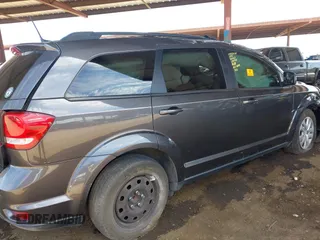 2019 Dodge Journey SE z VIN 3C4PDCBG9KT798938, wystawiony jako IAAI lot #42174970 z przebiegiem Nie podano mil oraz . Historia ofert i sprzedaży dostępna na DreamBid. Obrazek 8.