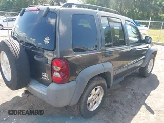 2005 Jeep Liberty Sport with VIN 1J4GL48545W655788, listed as a IAAI auction lot 41914703 with 166,899 mi miles and . Bid and sale history available at carsss.com. Image 4.