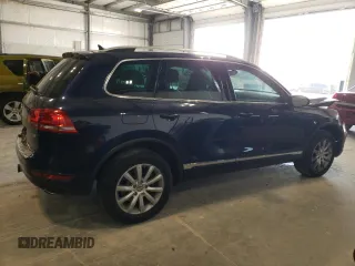 2012 Volkswagen Touareg Sport с VIN WVGEK9BP6CD009633, выставлен на аукционе Copart как лот 85475414 с пробегом 139 872 миль миль и Списание • Salvage title. История ставок и продаж доступна на DreamBid. Изображение 3.
