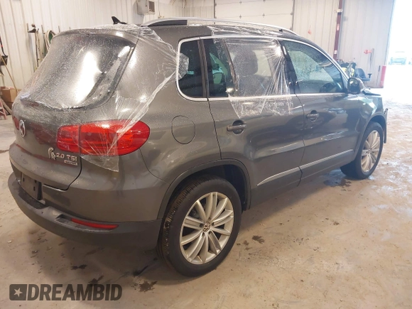 2012 Volkswagen Tiguan SE with VIN WVGBV7AX6CW093750, listed as a IAAI auction lot 42329775 with 117,509 mi miles and . Bid and sale history available at DreamBid. Image 4.