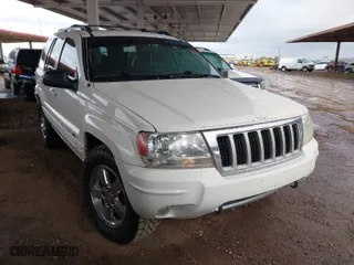 2004 Jeep Grand Cherokee Limited with VIN 1J8GW58N74C380204, listed as a IAAI auction lot 41756657 with 239,697 mi miles. Bid and sale history available at carsss.com. Image 1.